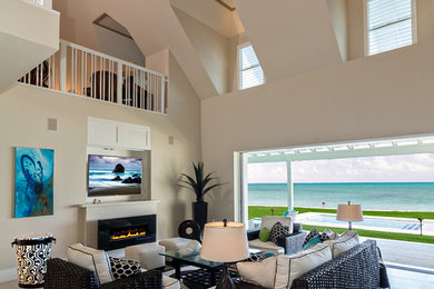 Beach style living room photo in Other