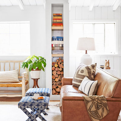 Living room - small coastal open concept light wood floor living room idea in Los Angeles with white walls