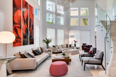 Inspiration for a large modern open concept marble floor and beige floor living room remodel in Miami with white walls