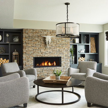 Beautiful Contemporary Living Room With Stone Fireplace and Charcoal Shelving