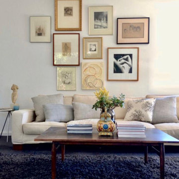 Beautifully curated Art in a sumptuously designed room.