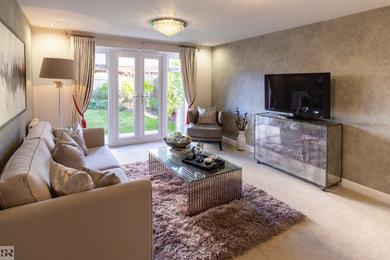 This is an example of a large contemporary formal enclosed living room in Other with grey walls, carpet, no fireplace, a freestanding tv and beige floors.