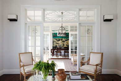 Inspiration for a large traditional living room in Sydney with white walls and dark hardwood flooring.