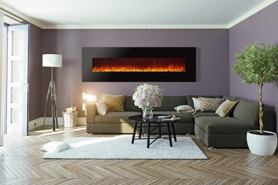 インディアナポリスにあるお手頃価格の中くらいなコンテンポラリースタイルのおしゃれなリビング (紫の壁、淡色無垢フローリング、吊り下げ式暖炉、ベージュの床) の写真