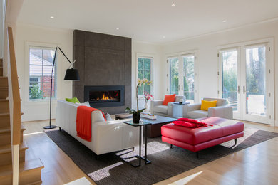Inspiration for a large contemporary open concept living room remodel in DC Metro with white walls, a ribbon fireplace and a metal fireplace