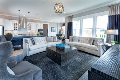 Example of a large trendy open concept and formal dark wood floor and brown floor living room design in Columbus with gray walls and no tv