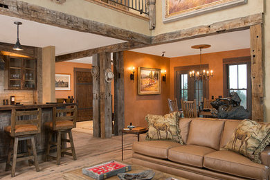 This is an example of a rustic living room in Other.