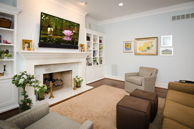 Mid-sized elegant enclosed dark wood floor and brown floor living room photo in Detroit with blue walls, a standard fireplace, a tile fireplace and a media wall
