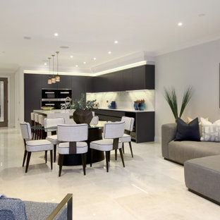 Inspiration for a medium sized contemporary open plan living room in London with grey walls and grey floors.
