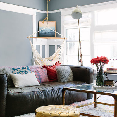 Example of an eclectic living room design in Los Angeles with gray walls