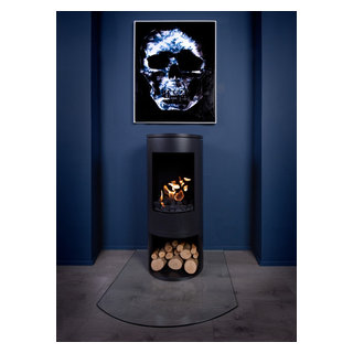 Black Modern Cylinder Bioethanol Stove with a dramatic painting - Modern -  Living Room - London - by Bio Fires | Houzz