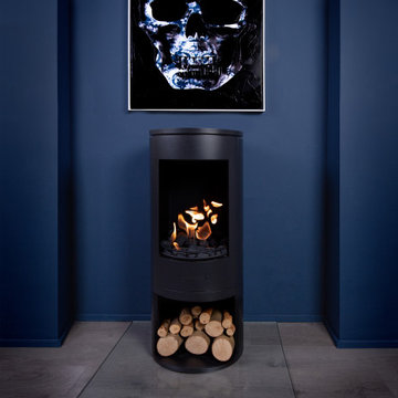 Black Modern Cylinder Bioethanol Stove with a dramatic painting