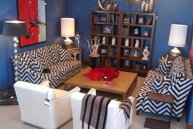 Example of a mid-sized transitional enclosed carpeted living room design in Other with blue walls