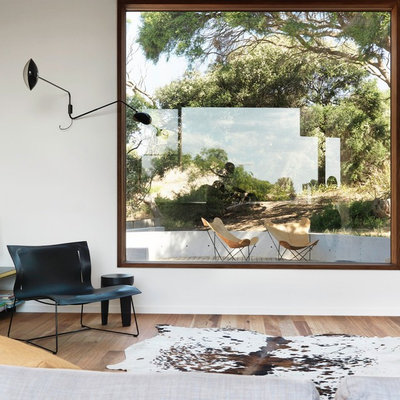Living room - mid-sized contemporary open concept light wood floor living room idea in Melbourne with white walls