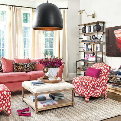 Living room - eclectic dark wood floor living room idea in Atlanta with white walls