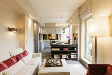 Idee per un piccolo soggiorno tradizionale aperto con sala formale, pareti beige e pavimento con piastrelle in ceramica