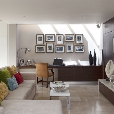 Inspiration for a contemporary open concept living room remodel in Other with a media wall