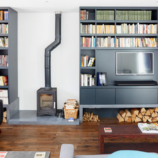 75 Beautiful Living Room With A Wood Stove And A Media Wall Pictures Ideas February 2021 Houzz