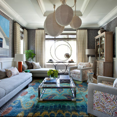 Inspiration for an eclectic formal carpeted living room remodel in New York with gray walls