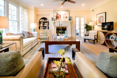 Example of a large trendy formal and enclosed carpeted living room design in Other with yellow walls, a standard fireplace, a tile fireplace and no tv