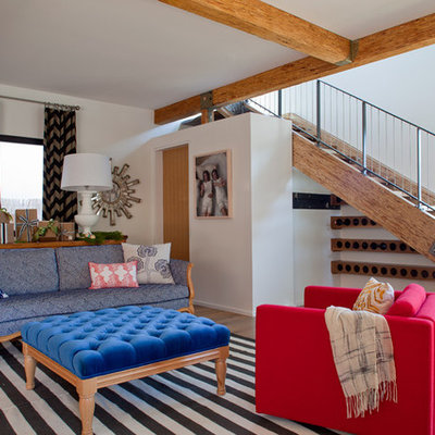 Example of an eclectic living room design in San Francisco with white walls