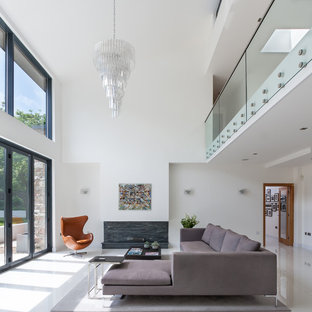 Inspiration for a medium sized contemporary open plan living room in Other with white walls, no tv and white floors.