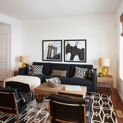 Inspiration for a contemporary open concept living room remodel in Calgary with white walls
