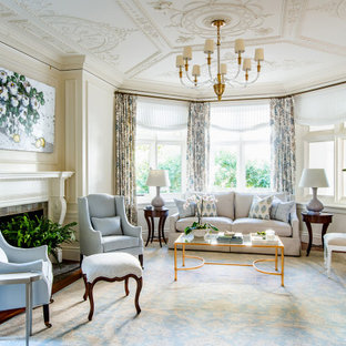 Immagine di un soggiorno chic con pareti bianche, moquette, camino classico, pavimento blu e boiserie