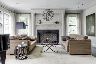 Living room - transitional dark wood floor and black floor living room idea in Boston with gray walls and a standard fireplace