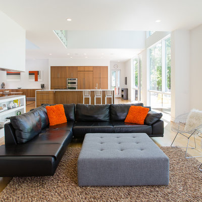 Living room - mid-sized contemporary open concept and formal medium tone wood floor and brown floor living room idea in DC Metro with white walls, no fireplace and no tv