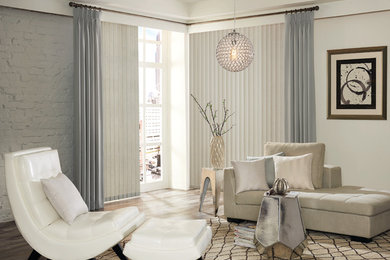 Medium sized contemporary formal open plan living room in Minneapolis with grey walls, medium hardwood flooring and multi-coloured floors.