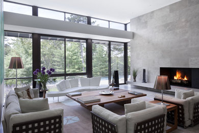 Modelo de salón para visitas abierto minimalista grande sin televisor con paredes grises