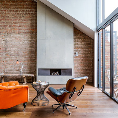 Mid-sized urban dark wood floor and brown floor living room photo in London with a ribbon fireplace and a metal fireplace