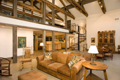 Ejemplo de salón abierto clásico grande sin chimenea y televisor con paredes blancas, suelo de madera clara y suelo gris