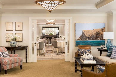 This is an example of a medium sized beach style formal enclosed living room in Los Angeles with white walls and carpet.