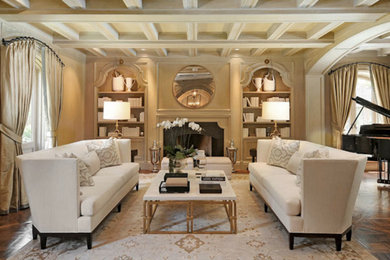 Foto di un grande soggiorno classico con sala formale, pareti beige, parquet scuro, camino classico e nessuna TV