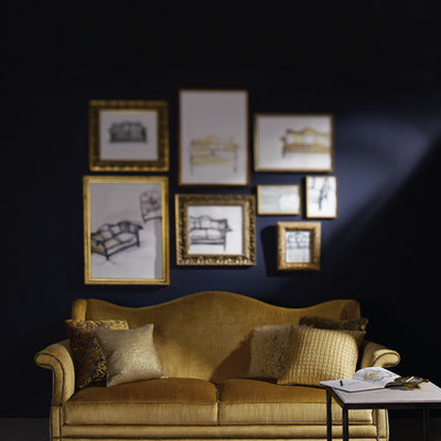 Example of a trendy living room design in New York with blue walls