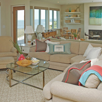 Living room - mid-sized coastal open concept carpeted and beige floor living room idea in Other with a standard fireplace and gray walls