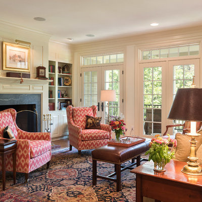 Living room - mid-sized traditional formal and open concept dark wood floor and brown floor living room idea in Other with beige walls, a standard fireplace and a stone fireplace