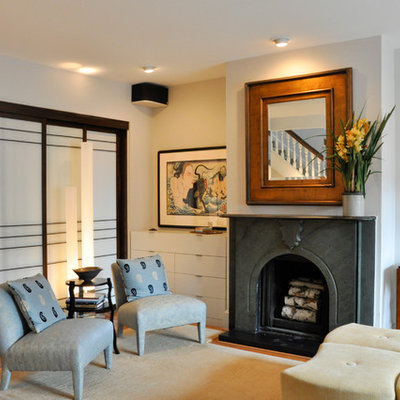 Living room - asian medium tone wood floor living room idea in DC Metro with a standard fireplace