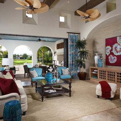 Island style open concept living room photo in Miami with white walls