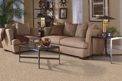 Inspiration for a carpeted living room remodel in Seattle with beige walls