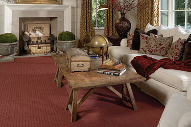 Inspiration for a mid-sized formal and enclosed carpeted living room remodel in New York with a standard fireplace and no tv