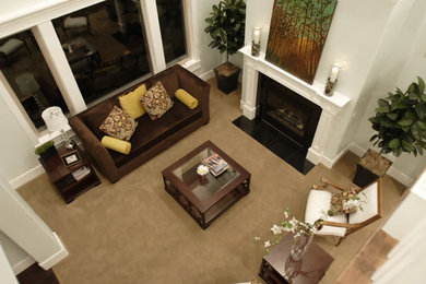 Mid-sized transitional open concept carpeted and brown floor living room photo in Salt Lake City with gray walls, a standard fireplace and a tile fireplace
