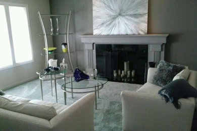 Inspiration for a mid-sized transitional enclosed and formal carpeted and beige floor living room remodel in Seattle with a standard fireplace, a tile fireplace, gray walls and no tv