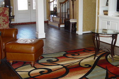 Example of a large dark wood floor living room design in Austin