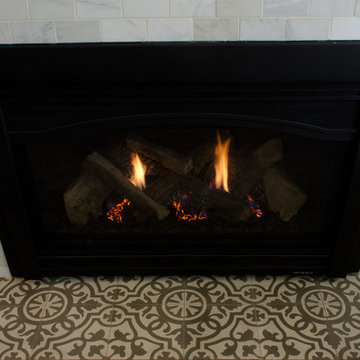 Carrera Marble Refreshes Living Room Fireplace