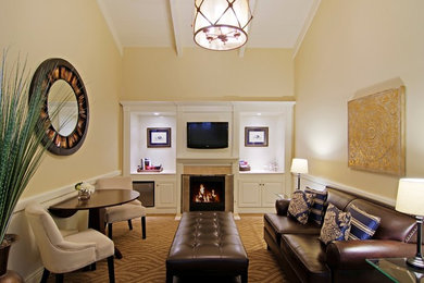 Example of a mid-sized classic formal and enclosed carpeted living room design in San Francisco with beige walls, a standard fireplace, a tile fireplace and a wall-mounted tv