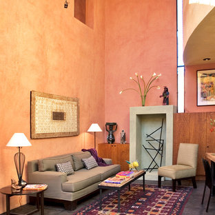 Living room - mid-sized modern living room idea in Mexico City with orange walls
