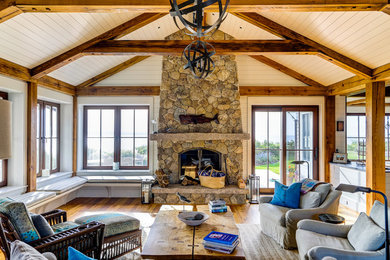Casual beach living room with exposed wood barn beams
